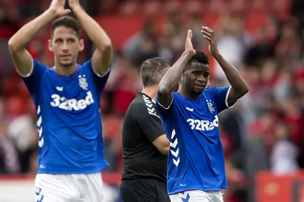 Rangers Lassana Coulibaly Celebrates Aberdeen Victory with Fans at Pittodrie Stadium