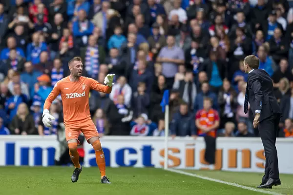 Steven Gerrard Consults with Allan McGregor during Rangers Match at Ibrox Stadium