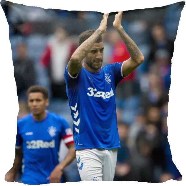 Rangers Connor Goldson Embraces Victory and Fans in Ibrox Stadium
