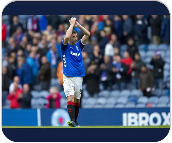 Rangers Jon Flanagan Celebrates with Ibrox Fans: Triumphant Moment in Ladbrokes Premiership Victory Against St. Mirren