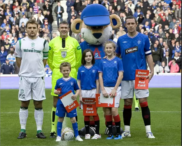 Rangers vs Hibernian: A Thrilling Draw at Ibrox Stadium - Clydesdale Bank Premier League Clash with Rangers Mascots
