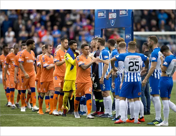 Sportsmanship at Rugby Park: Rangers and Kilmarnock Players Exchange Hands After Betfred Cup Match