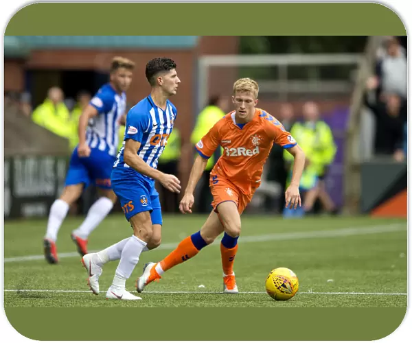 Rangers Ross McCrorie in Pursuit: The Betfred Cup Showdown at Rugby Park vs. Kilmarnock