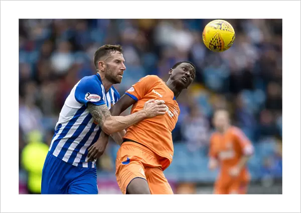 Rangers Umar Sadiq Stands Firm Against Kirk Broadfoot in Heated Betfred Cup Showdown at Rugby Park