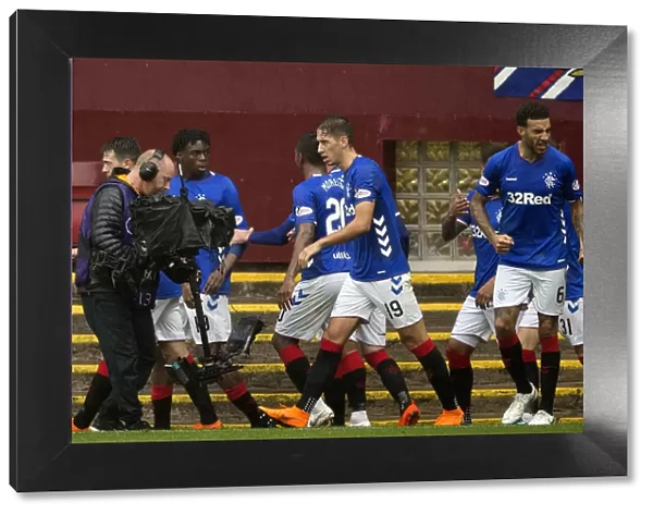 Rangers Ejaria Scores and Celebrates with Team Mate in Thrilling Ladbrokes Premiership Match at Fir Park