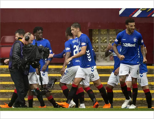 Rangers Ejaria Scores and Celebrates with Team Mate in Thrilling Ladbrokes Premiership Match at Fir Park
