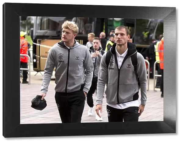 Rangers Worrall and Barisic Arrive at Celtic Park for Epic Premiership Showdown