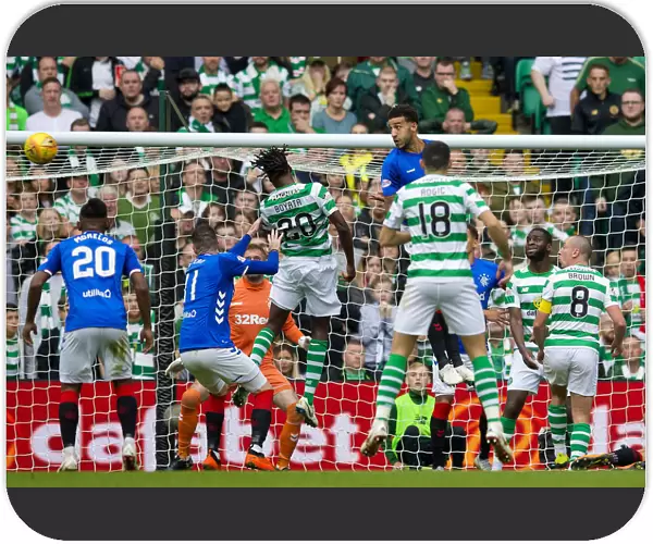 Rangers vs Celtic: Connor Goldson Clears the Ball at Celtic Park - Ladbrokes Premiership Clash