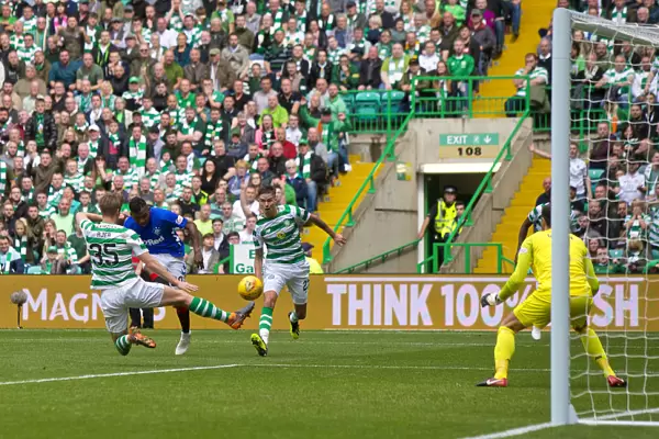 Rangers Morelos Threatens Celtic's Goal: Intense Moment in Ladbrokes Premiership Clash at Celtic Park