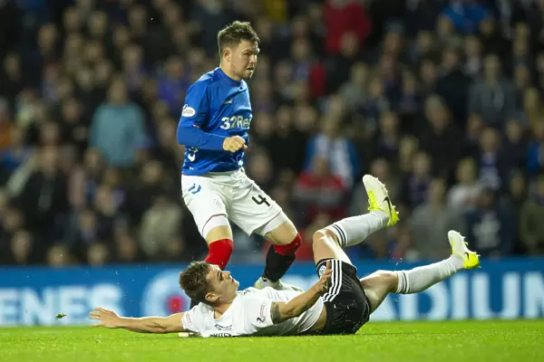 Glenn Middleton's Brace: Rangers Victory in Betfred Cup Quarterfinal at Ibrox Stadium