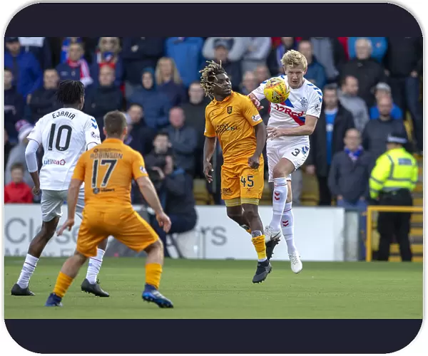 Rangers vs Livingston: Thrilling Moment as Joe Worrall Leaps over Dolly Menga in Ladbrokes Premiership Clash at Tony Macaroni Arena