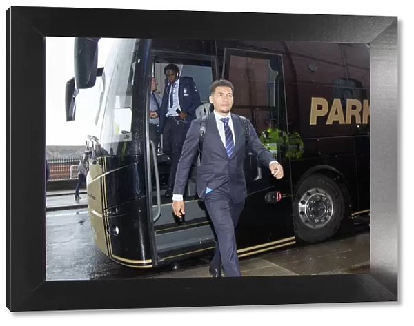 Rangers Captain James Tavernier Exits Team Bus in Premiership Suit for Rangers vs Hearts at Ibrox Stadium