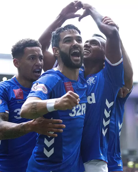 Triumphant Threesome: Morelos, Candeias, and Tavernier Celebrate Rangers Goal at Ibrox