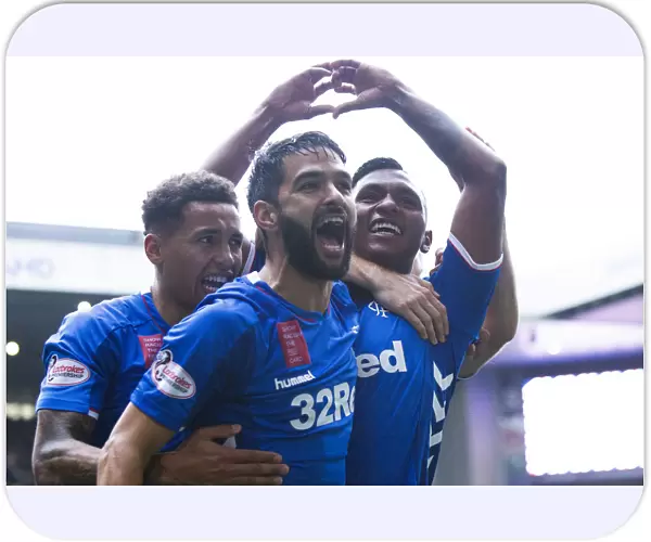 Triumphant Threesome: Morelos, Candeias, and Tavernier Celebrate Rangers Goal in Ibrox (Scottish Premiership 2021)