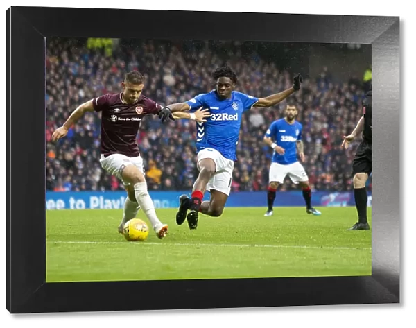 Rangers vs Hearts: Ovie Ejaria Tackles Olly Lee - Intense Moment at Ibrox Stadium, Ladbrokes Premiership