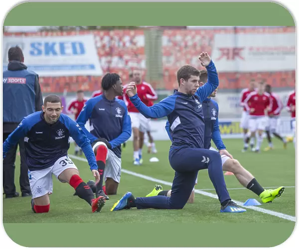 Rangers Players Jon Flanagan and Eros Grezda Warm Up Ahead of Hamilton Academical Clash at Hope Central Business District Stadium