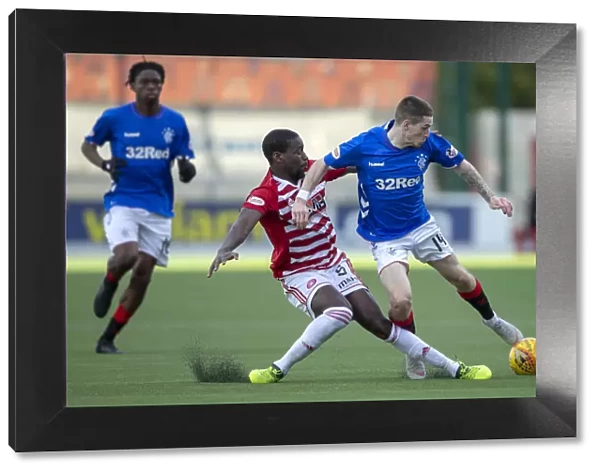 Rangers Ryan Kent Fouled by Hamilton's Tshiembe in Ladbrokes Premiership Clash at Hope Central Business District Stadium