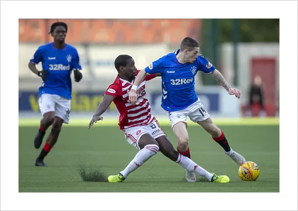 Rangers Ryan Kent Fouled by Hamilton's Tshiembe in Ladbrokes Premiership Clash at Hope Central Business District Stadium