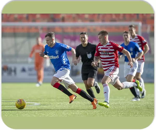Rangers Andy Halliday Charges Forward in Ladbrokes Premiership Clash at Hamilton's Hope Central Business District Stadium