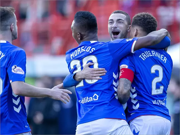 Rangers Tavernier and Grezda Celebrate Goal in Hamilton: Ladbrokes Premiership Clash