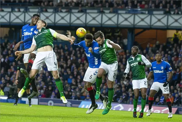 Rangers Connor Goldson Goes for the Ball in Intense Scottish Premiership Clash at Ibrox Stadium