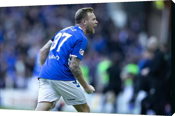 Rangers Scott Arfield: Thrilling Goal Celebration as Rangers Secure Scottish Premiership Victory at Ibrox (Scottish Cup Champions 2003)