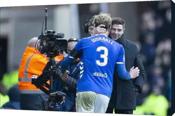 Steven Gerrard Consoles Joe Worrall: A Moment of Emotion at Ibrox Amidst the Rangers-Celtic Rivalry (Scottish Premiership)