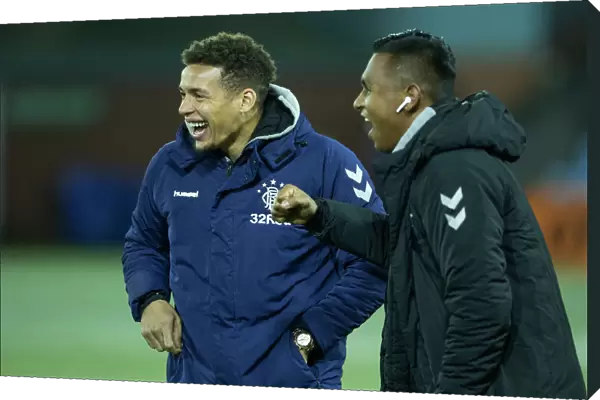 Rangers Tavernier and Morelos: A Playful Moment Amidst Rugby Park Rivalry (Scottish Premiership Champions 2003)