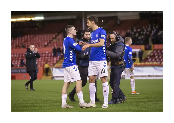 Rangers Triumph: Kent and Katic Celebrate Scottish Premiership Victory at Pittodrie Stadium