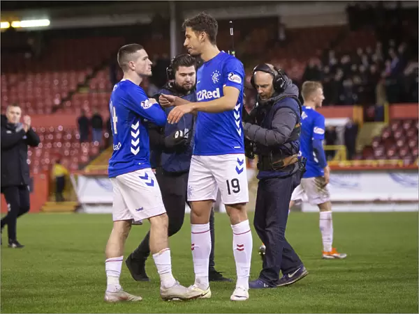 Rangers Triumph: Kent and Katic Celebrate Scottish Premiership Victory at Pittodrie Stadium
