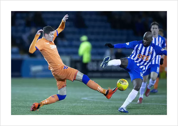 Rangers vs Kilmarnock: Kyle Lafferty Tackles Youssouf Mulumbu in the Fifth Round of the Scottish Cup at Rugby Park