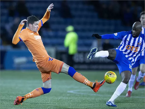 Rangers vs Kilmarnock: Kyle Lafferty Tackles Youssouf Mulumbu in the Fifth Round of the Scottish Cup at Rugby Park