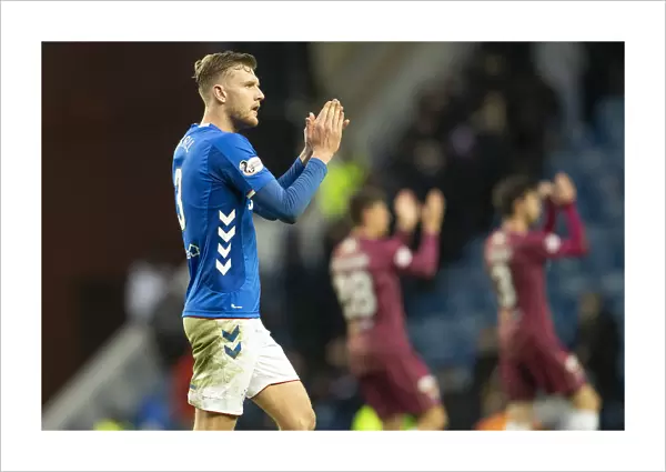 Rangers Joe Worrall Celebrates Scottish Premiership Victory and Salutes Ibrox Fans: A Nod to the 2003 Scottish Cup Champions