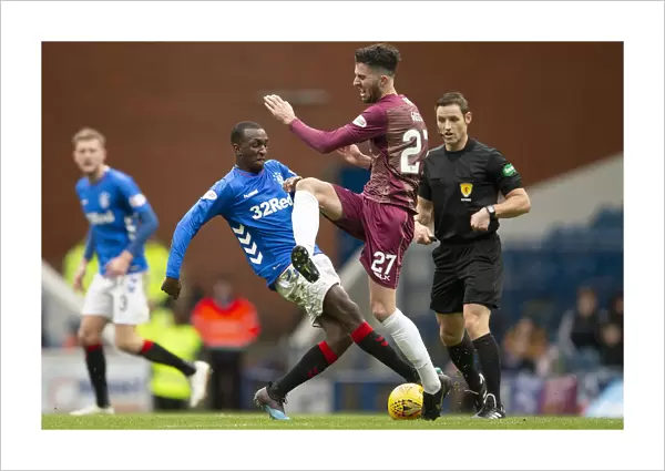 Rangers vs St. Johnstone: Glen Kamara Tackles Sean Goss in Scottish Premiership Action at Ibrox Stadium