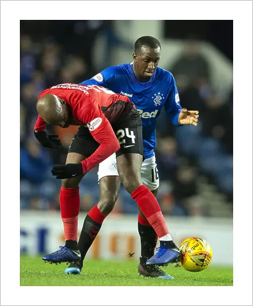 Rangers vs Kilmarnock: Glen Kamara Tackles Youssouf Mulumbu in Fifth Round Scottish Cup Replay at Ibrox Stadium