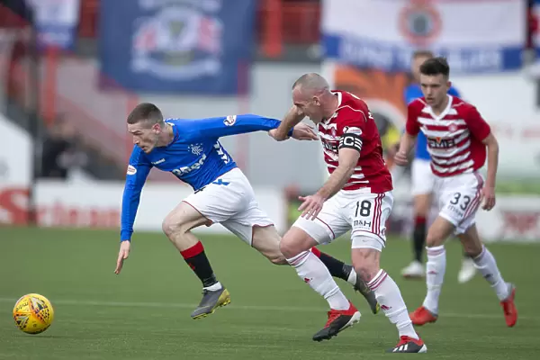 Rangers vs Hamilton Academical: Intense Battle Between Ryan Kent and Darian MacKinnon in the Scottish Premiership