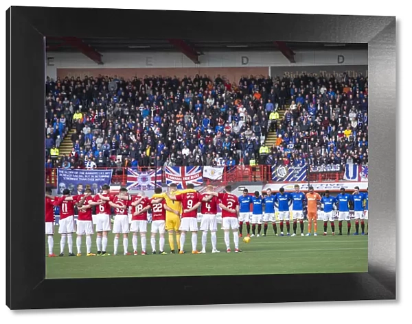 Scottish Cup Victory: Rangers and Hamilton Players Honor the Fallen with a Silent Tribute (2003)