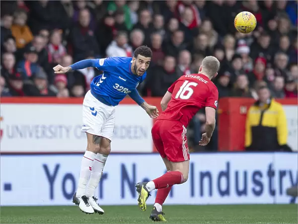 Rangers Connor Goldson Heads the Ball in Scottish Cup Quarter-Final at Pittodrie Stadium