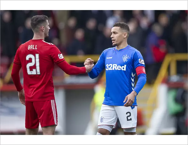 Rangers and Aberdeen - Scottish Cup Quarter-Final: Tavernier and Ball Share a Moment at Pittodrie Stadium