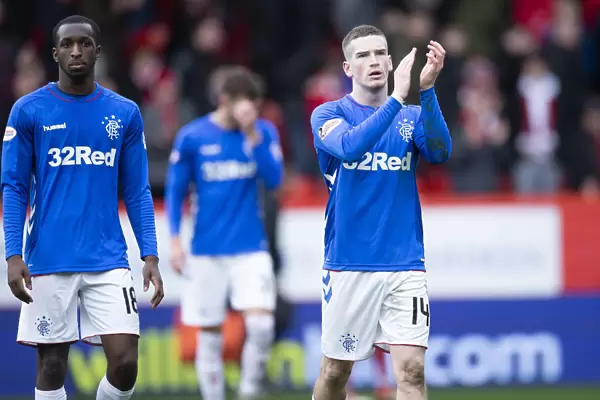 Ryan Kent's Triumphant Applause: Rangers Celebrate Scottish Cup Victory at Pittodrie Stadium