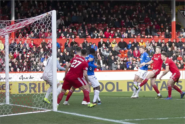 Joe Worrall Scores the Winner: Rangers Triumph in the Scottish Cup Quarter-Final at Pittodrie Stadium
