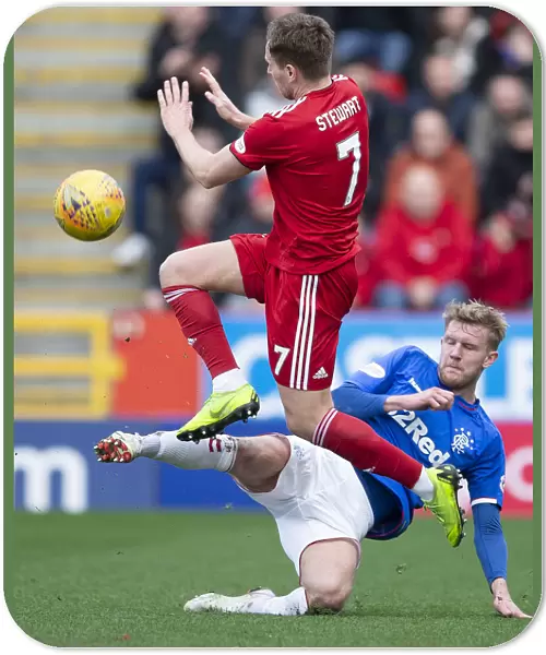 Rangers vs Aberdeen: Worrall Tackles Stewart in Intense Scottish Cup Quarter-Final Clash at Pittodrie Stadium