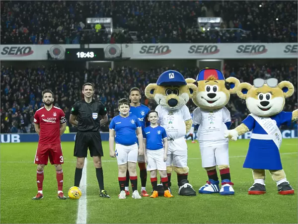 Rangers Captain Tavernier with Scottish Cup Mascots: Quarter Final Replay at Ibrox Stadium - A Nod to Past Glory