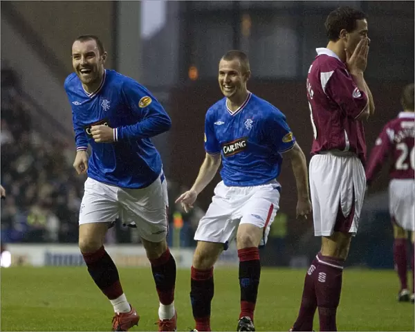Triumphant Moment: Kris Boyd and Kenny Miller's Goal Celebration - Rangers 3-0 Victory over St. Johnstone at Ibrox