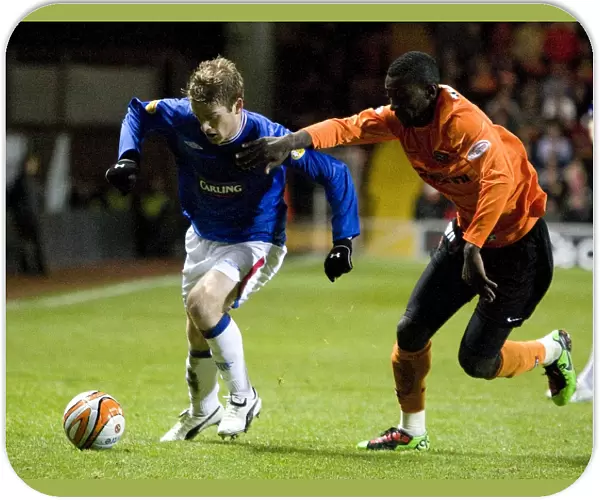 Rangers Steven Davis Subdues Prince Buaben: 3-0 Victory Over Dundee United