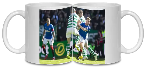 Scottish Derby: Arfield vs. Brown - Intense Tackle at Celtic Park