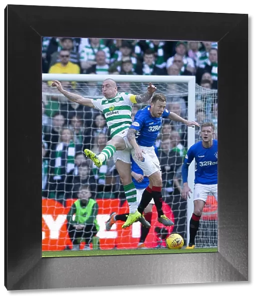 Scott Arfield Leaps Over Scott Brown in Intense Celtic vs. Rangers Rivalry, Scottish Premiership, Celtic Park