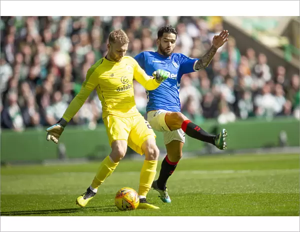 Celtic vs Rangers: Intense Battle - Daniel Candeias Tackles Scott Bain at Celtic Park