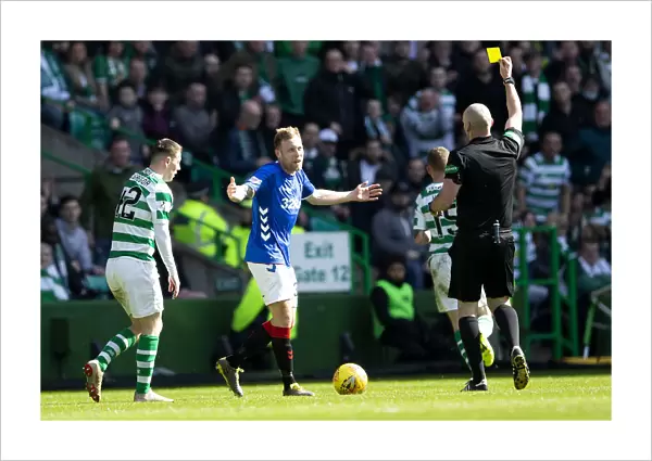 Rangers Scott Arfield Faces a Yellow Card Against Celtic in Scottish Premiership Clash at Celtic Park