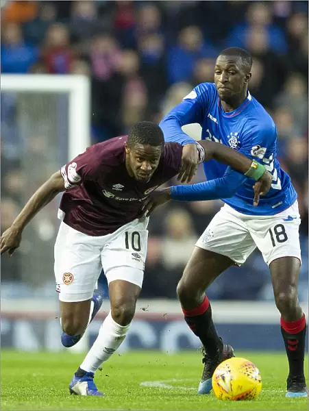 Rangers vs Hearts: Glen Kamara Holds Back Arnaud Djoum at Ibrox Stadium